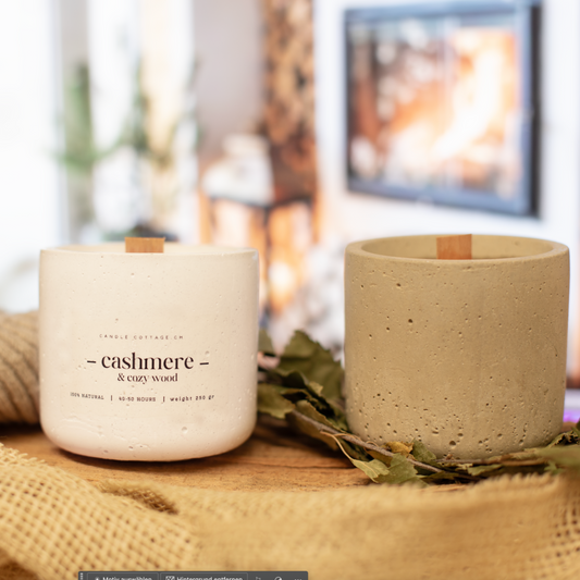 Handcrafted Duftkerze Betti in concrete holder, enhancing home ambiance with natural, soothing scent.